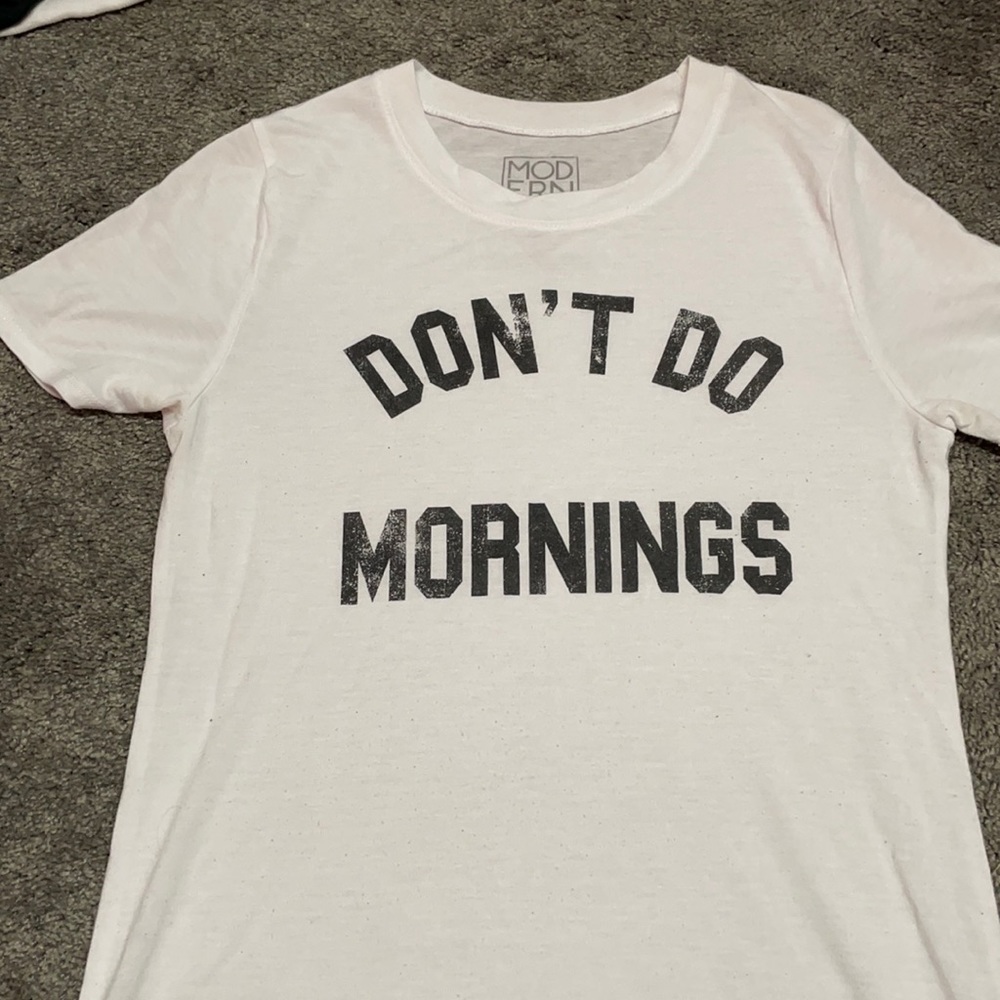 White graphic tee with black lettering